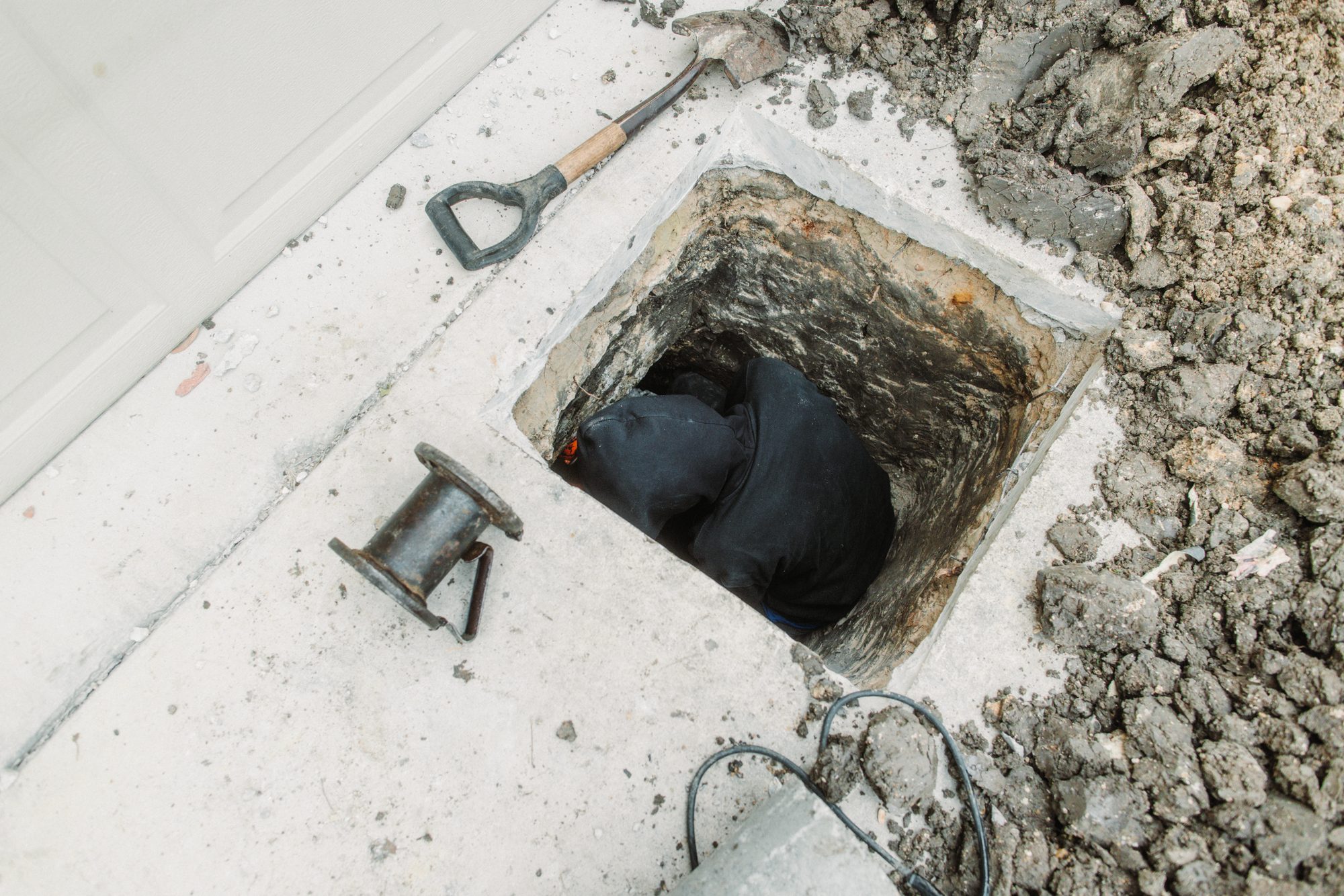 Pier hole with ram, Imperial Foundation Repair job site in North Texas
